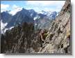 Hector traverse avec au fond la Barre des Ecrins, les Bans, le Gioberney, le Sirac, etc., etc.